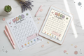 Monthly mood tracker printable shown on iPad and paper, soft girl wellness journal page instant download PDF
